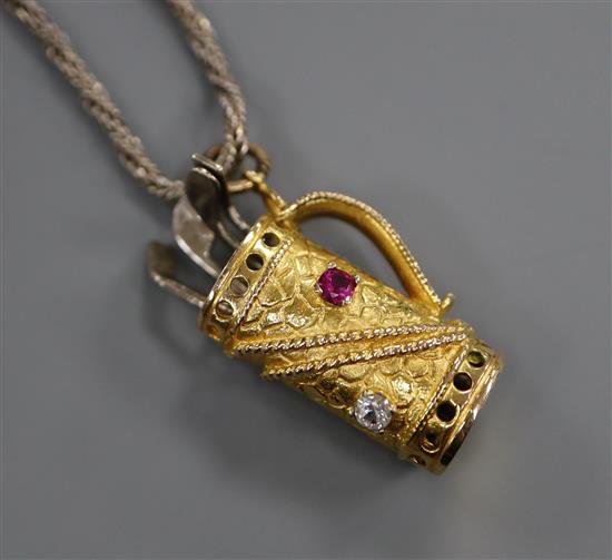 A 9ct gold and gem set 'golf bag' pendant, on a 925 chain, pendant 22mm.